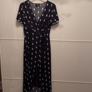 Vici wrap style dress.New,never worn, no tags. wrap tie for slimming waste.